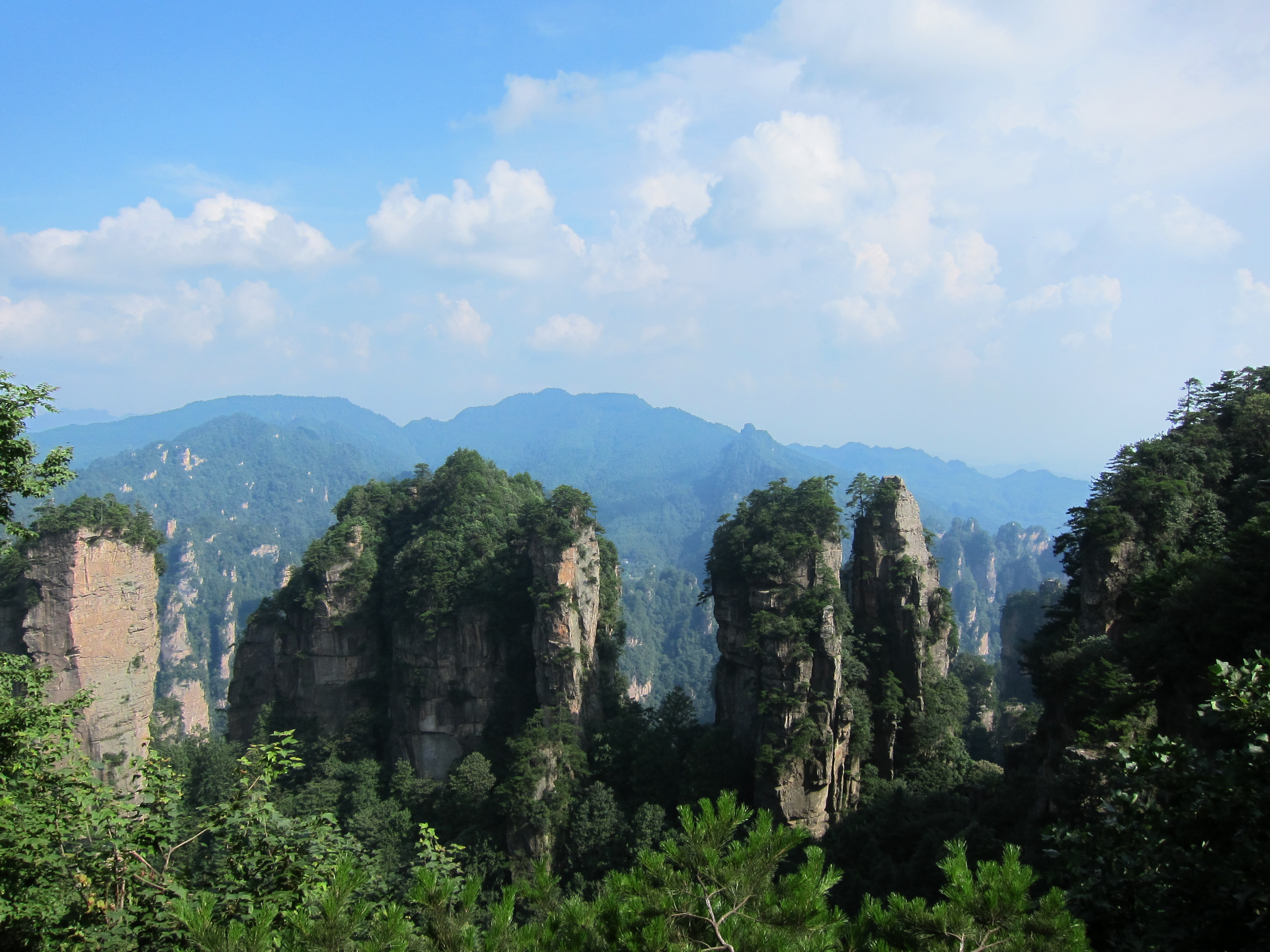 Sandstone pillars rising through mist at Zhangjiajie